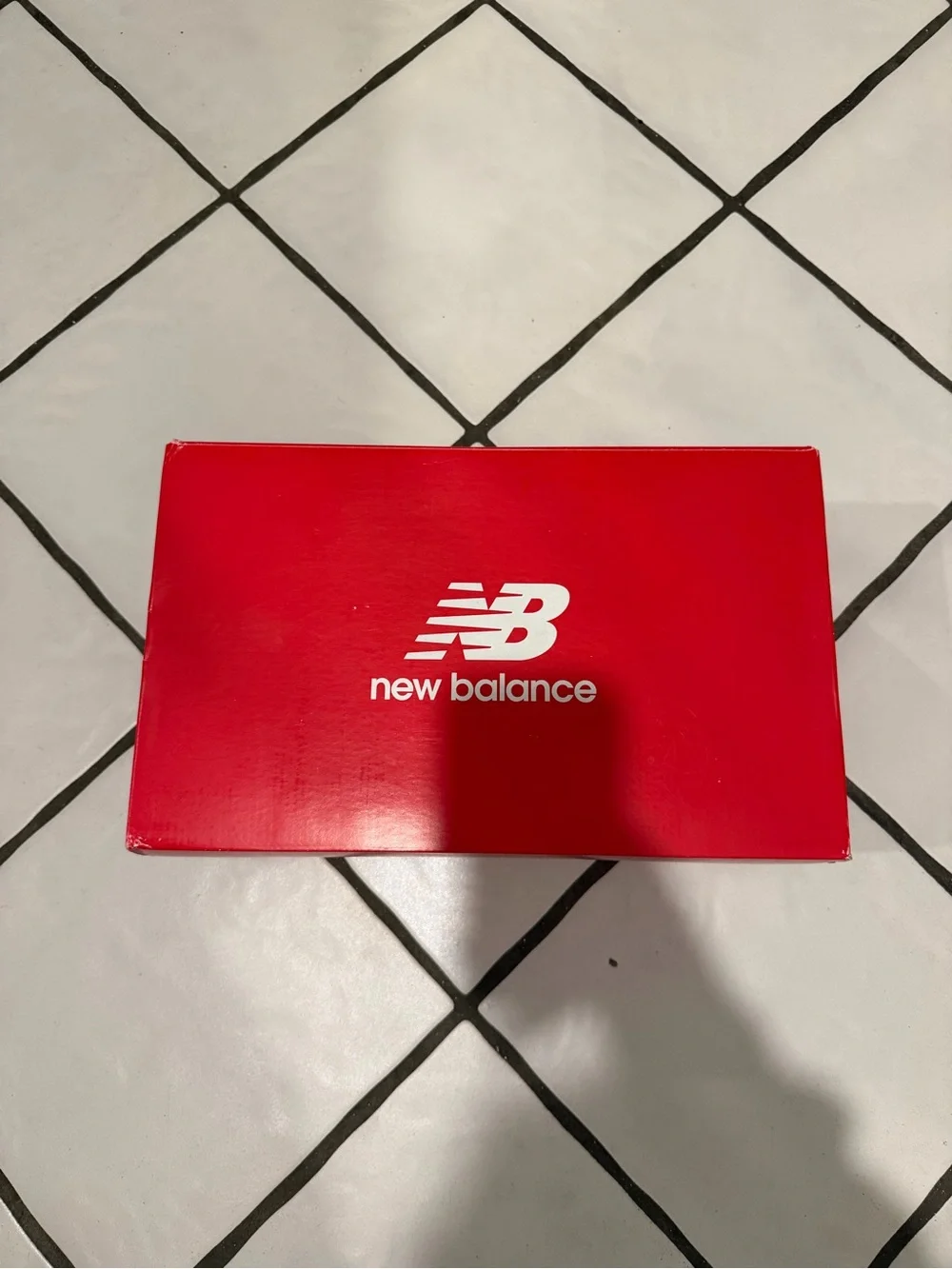 New Balance White Athletic Sneakers with Green Accents and Gum Outsole